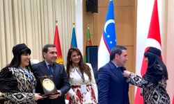 Hafız Dr. Selman Okumuş’a Özbekistan’dan Çifte Ödül