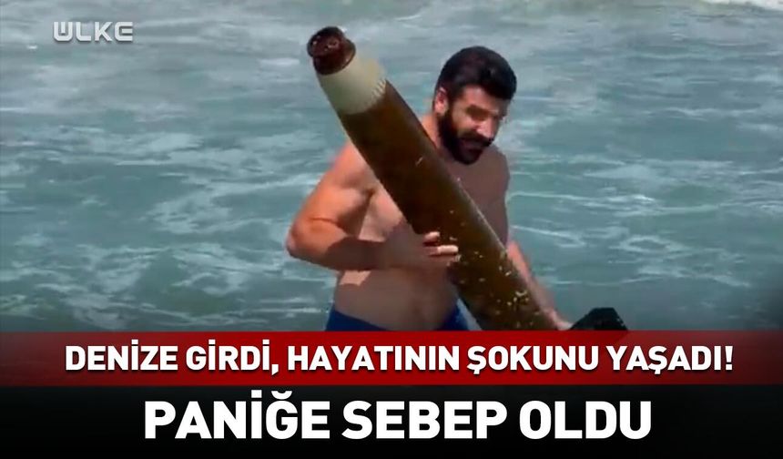 Denize girdi, hayatının şokunu yaşadı! Paniğe sebep oldu