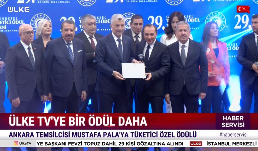 Ülke TV Ankara Temsilcisi Mustafa Pala ödülünü Bakan Bolat'ın elinden aldı